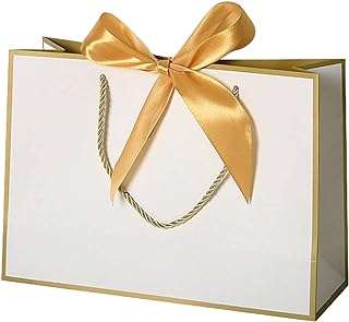 2 grands sacs cadeaux élégants avec ruban de satin doré cadeau. DIAYTAR COTE D'IVOIRE  - la destination ultime pour des achats en ligne pratiques et économiques. Découvrez notre large éventail de produits discount, allant des appareils ménagers aux technologies de pointe, en passant par la mode tendance, et profitez de nos offres imbattables pour réaliser des économies substantielles.