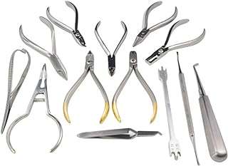 Ensemble d'instruments orthodontiques de 13 pièces en acier inoxydable avec jauge. Faites des économies sans compromettre votre satisfaction avec DIAYTAR COTE D'IVOIRE . Notre boutique en ligne propose une variété de produits discount dans différentes catégories, de l'électronique à la mode. Trouvez tout ce dont vous avez besoin à des prix imbattables !
