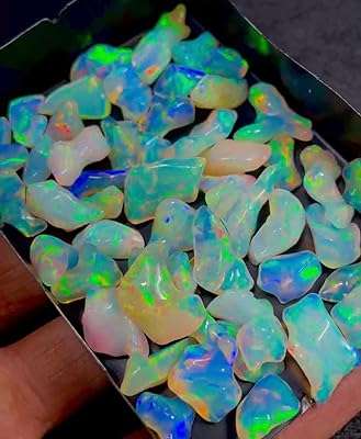 Pierres précieuses rares pierres brutes inégales opales éthiopiennes multi feux pour la fabrication de bijoux. Faites des économies sans compromis chez DIAYTAR COTE D'IVOIRE, votre destination de shopping en ligne pour des produits discount de qualité supérieure, allant des appareils électroniques à la décoration d'intérieur.
