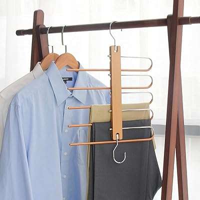 Cintre magique pour pantalons cintre de placard multifonctionnel à 5. DIAYTAR COTE D'IVOIRE  : la solution idéale pour des achats malins en ligne. Profitez de notre large gamme de produits discount, allant des appareils électroménagers essentiels aux dernières tendances de la mode, en passant par les accessoires informatiques indispensables, et économisez tout en vous faisant plaisir.