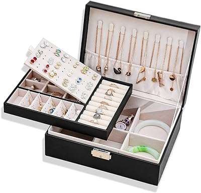 Il y a une boîte à bijoux 2 niveaux en simili cuir pour femme. Ne payez pas plus cher pour les mêmes produits ailleurs ! DIAYTAR COTE D'IVOIRE  propose une large gamme de produits de qualité à des prix discount. Trouvez tout ce dont vous avez besoin, des appareils ménagers aux gadgets dernier cri, et économisez de l'argent sans compromettre la qualité.