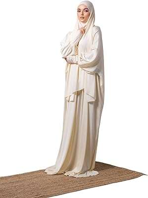 Une abaya de prière avec un motif de pleine lune pour la shahna. Faites des économies sur tous vos achats avec DIAYTAR COTE D'IVOIRE . Notre boutique en ligne vous propose des articles de qualité à prix cassés, que ce soit pour votre maison, l'électroménager, l'informatique ou encore la mode. Ne cherchez plus ailleurs, les meilleures offres discount sont chez nous !