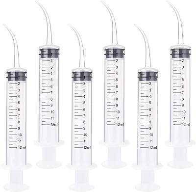 Mangeoire pour animaux de compagnie de 12 ml avec seringue d'irrigation dentaire pointe incurvée le rinçage. Découvrez DIAYTAR COTE D'IVOIRE, votre partenaire en ligne pour des achats malins et économiques. Parcourez notre sélection discount de produits pour la maison, l'électroménager, l'informatique, la mode et les gadgets et trouvez les meilleures offres du marché. Profitez de la qualité à prix réduit dès aujourd'hui, grâce à notre boutique en ligne pratique et facile à utiliser.
