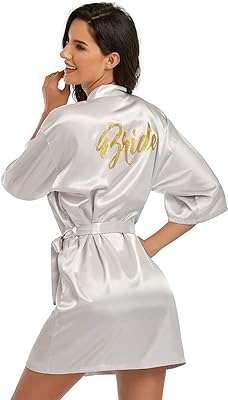Robe de mariée en satin kimono de mariage robe prête à l'emploi. DIAYTAR COTE D'IVOIRE, votre partenaire de shopping discount en ligne, regroupe une large gamme de produits à prix cassés pour tous les amateurs de bonnes affaires. Faites des économies sur vos achats de la maison à l'électroménager, de l'informatique à la mode, grâce à DIAYTAR COTE D'IVOIRE !