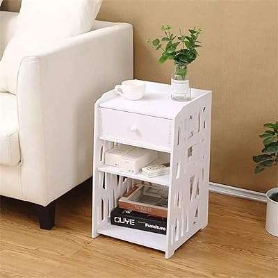 Petite table de chevet blanche avec bibliothèque à 3 niveaux pour petit. DIAYTAR COTE D'IVOIRE  est votre guichet unique pour des produits discount de premier ordre. Parcourez notre catalogue en ligne et découvrez notre sélection soigneusement choisie d'articles pour la maison, l'électroménager, l'informatique et la mode, tous disponibles à des prix abordables. Vous ne trouverez pas de meilleurs deals ailleurs !