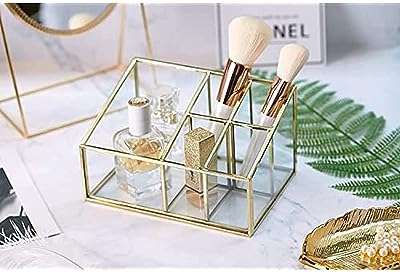 Organiseur de maquillage puto 5 compartiments en verre métal et laiton rangement pour cosmétiques. DIAYTAR COTE D'IVOIRE, votre destination en ligne pour des achats malins. Parcourez notre vaste sélection de produits discount allant de la maison à l'électronique en passant par la mode et l'informatique. Ne sacrifiez pas la qualité pour le prix lorsque vous pouvez avoir les deux chez nous.