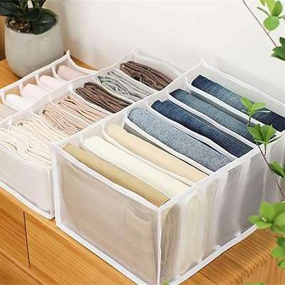 Organisateur de tiroir pliant armoire de rangement en maille à 7 compartiments taille personnalisée pour placard. DIAYTAR COTE D'IVOIRE, la boutique en ligne polyvalente qui répond à tous vos besoins d'articles ménagers à bas prix. Des ustensiles de cuisine pratiques aux produits d'entretien essentiels, nous avons tout ce dont vous avez besoin pour faciliter votre quotidien sans dépenser une fortune. Ne manquez pas nos bonnes affaires !