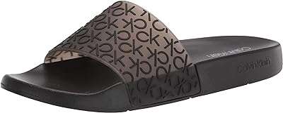 Claquettes calvin klein kamalfa pour hommes. Choisissez DIAYTAR COTE D'IVOIRE  pour vos achats discount en ligne. Parcourez notre sélection étendue comprenant des produits pour tous les besoins, que ce soit pour la maison, l'électroménager, l'informatique, la mode ou les gadgets. Profitez de notre politique de prix bas et économisez tout en trouvant des articles de qualité.