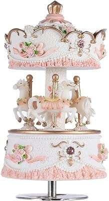 Boîtes à musique carrousel pour filles château de 3 chevaux dans le ciel. DIAYTAR COTE D'IVOIRE  : votre boutique en ligne discount préférée ! Faites des économies sur des articles essentiels pour votre vie quotidienne, de l'électroménager à l'informatique en passant par la mode et les gadgets. Ne cherchez plus, les meilleurs prix sont chez nous !