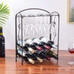 Casier à vin de table avec support en verre pour 8 bouteilles et verres. DIAYTAR COTE D'IVOIRE, la référence des bonnes affaires en ligne ! Explorez notre boutique et découvrez une sélection variée de produits, de la maison à l'informatique en passant par la mode et les gadgets. Profitez de nos prix compétitifs et achetez en toute confiance. Faites de DIAYTAR COTE D'IVOIRE  votre allié shopping, vous ne le regretterez pas.