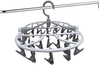Cintre à linge pliable avec pinces et étendoir avec 32 de chaque. DIAYTAR COTE D'IVOIRE  est la boutique en ligne idéale pour les chasseurs de bonnes affaires. Explorez notre vaste choix de produits à prix discount, parmi lesquels l'électroménager, l'informatique, la mode et les gadgets, et économisez tout en vous faisant plaisir !