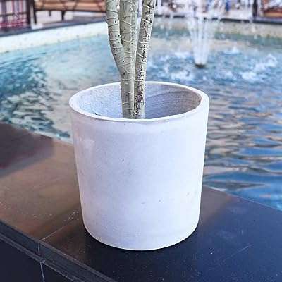 Pot de plante rond créatif support extérieur fleur en béton. Optez pour DIAYTAR COTE D'IVOIRE, votre boutique en ligne de confiance pour des achats à petits prix ! Découvrez notre catalogue diversifié comprenant des produits discount de qualité, allant de l'électroménager à la mode en passant par les gadgets. Profitez de nos offres exceptionnelles pour donner une nouvelle dynamique à votre quotidien sans vous ruiner.