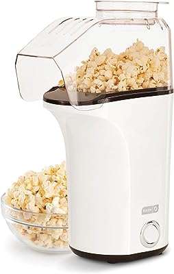Dash hot air popper avec tasse à mesurer pour grains de maïs. Ne payez pas le prix fort, optez pour DIAYTAR COTE D'IVOIRE  et économisez sur tous vos achats ! Notre boutique en ligne vous propose une large gamme de produits discount pour équiper votre maison, des meubles élégants aux derniers gadgets électroniques. Bénéficiez de réductions imbattables sur les appareils informatiques de pointe et restez tendance avec nos vêtements et accessoires à petits prix. Profitez d'une expérience d'achat sans stress avec une livraison rapide et un service client exceptionnel !