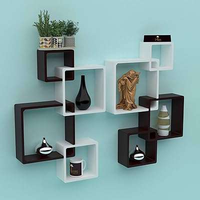 Étagères murales en forme de croix en bois rafove (lot de 8) (taille standard noir et blanc). Plongez dans l'univers des bonnes affaires avec DIAYTAR COTE D'IVOIRE  ! Notre boutique en ligne vous propose une sélection de produits discount dans différents domaines, allant des indispensables de la maison aux dernières tendances en matière de mode et de technologie. Naviguez à travers notre catalogue et profitez d'offres à ne pas manquer.