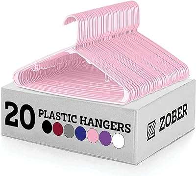 Paquet de 20 cintres en plastique zober cintres rose robustes peu encombrants pour manteaux. DIAYTAR COTE D'IVOIRE  - La boutique en ligne qui vous offre des prix imbattables sur une large gamme de produits discount. Ajoutez du style à votre maison avec nos articles de décoration, simplifiez votre quotidien avec des électroménagers modernes, restez connecté avec nos gadgets technologiques et adoptez les dernières tendances de la mode sans vous ruiner. Faites de bonnes affaires à chaque achat chez nous !