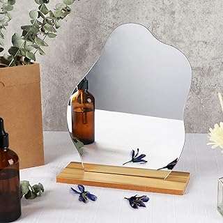 Miroir de maquillage en acrylique pour bureau avec support décoration. DIAYTAR COTE D'IVOIRE  : votre destination en ligne pour des achats discount en toute facilité. Explorez notre vaste sélection de produits comprenant des articles pour la maison, des appareils électroniques, des vêtements à la mode et bien plus encore. Profitez des meilleurs prix et faites de bonnes affaires chez DIAYTAR COTE D'IVOIRE  !