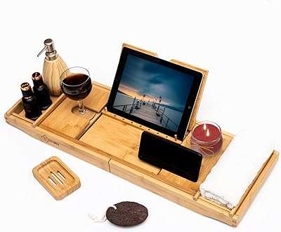 Casa unica plateau de bain en bambou naturel avec support pour iphone ipad et verre. DIAYTAR COTE D'IVOIRE  est l'adresse incontournable pour tous ceux qui cherchent des produits discount en ligne. Parcourez notre site et trouvez des offres imbattables sur une grande variété de produits, des articles pour la maison aux produits high-tech en passant par les dernières tendances mode et les gadgets les plus recherchés.