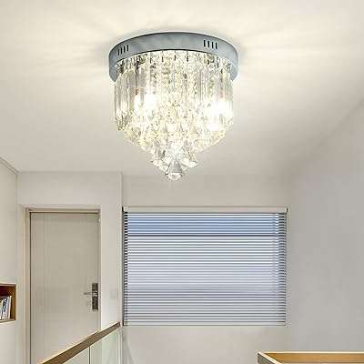 Janed lustre en cristal lustres chromés modernes luminaires suspendus en cristal k9 3 plafonniers pour salle. Achetez intelligemment chez DIAYTAR COTE D'IVOIRE  et profitez de notre vaste sélection de produits discount. De la décoration pour votre maison aux ustensiles de cuisine en passant par les appareils électroménagers, notre boutique en ligne généraliste vous offre la possibilité de faire des économies tout en vous procurant des produits de qualité.