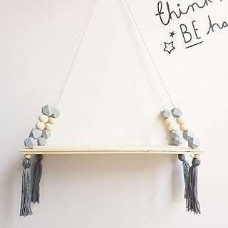 Étagère murale à franges en bois avec perles colorées nordiques étagère suspendue de rangement. Envie d'être à la pointe de la mode sans dépenser une fortune ? DIAYTAR COTE D'IVOIRE  vous propose une sélection de vêtements et accessoires tendance à prix cassés. Que vous cherchiez des tenues pour toute la famille ou des pièces uniques pour vous démarquer, notre boutique en ligne généraliste vous garantit des achats mode discount qui feront sensation.