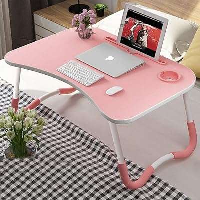 Table pour ordinateur portable. Explorez les offres exceptionnelles de DIAYTAR COTE D'IVOIRE, la boutique en ligne ultime pour les amateurs de bons plans. Trouvez tout ce dont vous avez besoin, de la maison à l'électroménager, de l'informatique à la mode en passant par les gadgets les plus tendance, le tout à des prix défiant toute concurrence.