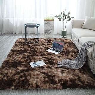 Tapis shaggy doux au toucher convient comme décoration de chambre marron. DIAYTAR COTE D'IVOIRE  - La meilleure adresse pour des prix imbattables sur une vaste sélection de produits. Que vous recherchiez des articles pour votre maison, votre informatique ou votre garde-robe, nous avons tout ce qu'il vous faut à prix discount. Explorez notre site dès maintenant et profitez des meilleures affaires en ligne!