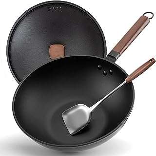 Wok en acier au carbone de 30 cm avec couvercle et spatule. Besoin de dépenser moins sans renoncer à la qualité ? DIAYTAR COTE D'IVOIRE  est là pour vous ! Explorez notre catalogue en ligne et découvrez une multitude de produits discount pour la maison, l'électroménager, l'informatique et la mode, qui répondront à tous vos besoins tout en respectant votre budget.