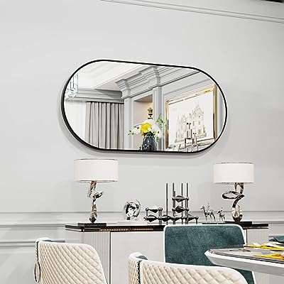 Miroir mural ovale noir wise four : 100 x 50 cm avec un cadre. Faites-vous plaisir sans vous ruiner avec DIAYTAR COTE D'IVOIRE, la boutique en ligne qui propose des produits discount pour tous les budgets. Venez découvrir notre sélection de produits pour la maison, l'électroménager, l'informatique et la mode, et profitez de remises exceptionnelles.