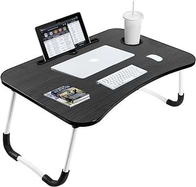 Bureau d'ordinateur portable pliable sky touch pour lit avec porte gobelet pour ipad support. DIAYTAR COTE D'IVOIRE, la boutique en ligne discount qui révolutionne votre shopping quotidien ! Profitez de prix mini sur une large gamme de produits, de la literie aux ordinateurs en passant par les appareils électroménagers et les tendances mode. Ne manquez pas nos offres exceptionnelles pour faire de bonnes affaires !