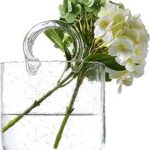 Vase à fleurs 9o9 (fait la main) en verre transparent  . Ne dépensez pas plus que nécessaire - choisissez DIAYTAR COTE D'IVOIRE  pour vos achats en ligne. Parcourez notre vaste sélection d'articles discount, allant des produits pour la maison à l'électroménager, en passant par l'informatique, la mode et les gadgets, et profitez de remises exceptionnelles. Avec des prix aussi attractifs, vous pourrez économiser tout en vous offrant des produits de qualité.