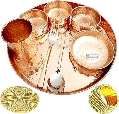 Bresha india craft assiette thali en cuivre pur bol cuillère fourchette et verre. DIAYTAR COTE D'IVOIRE  : la boutique en ligne incontournable pour des achats discount dans tous les domaines. Parcourez notre sélection variée allant des produits pour la maison à la technologie dernier cri en passant par la mode tendance. Obtenez des produits de qualité à des prix compétitifs, tout en profitant d'une expérience de shopping en ligne optimale avec DIAYTAR COTE D'IVOIRE  !