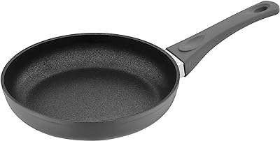 Poêle à frire antiadhésive saflon en titane de 11 pouces en aluminium. DIAYTAR COTE D'IVOIRE  - La boutique en ligne qui vous offre des prix imbattables sur une large gamme de produits discount. Ajoutez du style à votre maison avec nos articles de décoration, simplifiez votre quotidien avec des électroménagers modernes, restez connecté avec nos gadgets technologiques et adoptez les dernières tendances de la mode sans vous ruiner. Faites de bonnes affaires à chaque achat chez nous !