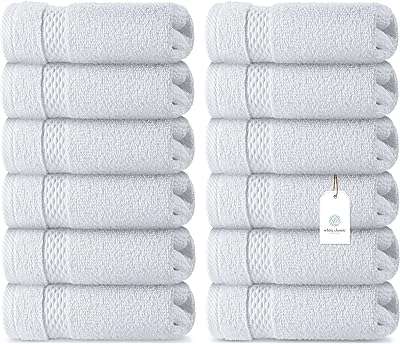 Serviettes de visage en coton de luxe classiques blanches grande serviette pour hôtels et spas. DIAYTAR COTE D'IVOIRE  révolutionne le shopping en ligne avec sa vaste sélection de produits discount. Trouvez tout ce dont vous avez besoin pour votre maison, des équipements électroménagers aux gadgets high-tech, en passant par les dernières tendances de la mode. Avec DIAYTAR COTE D'IVOIRE, vous pourrez faire des économies tout en profitant de produits de qualité. N'attendez plus et découvrez les avantages de notre boutique en ligne généraliste.