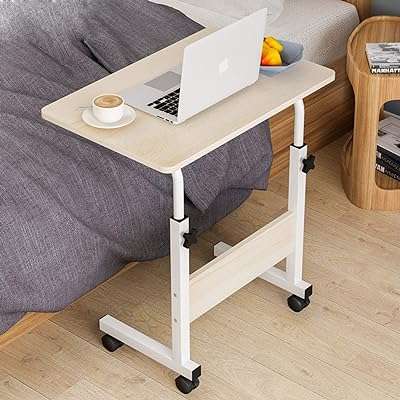 Table d'ordinateur pour bureau à domicile table de chevet portable. DIAYTAR COTE D'IVOIRE, votre boutique en ligne préférée pour des offres discount exceptionnelles. Explorez notre assortiment varié comprenant des produits de qualité pour la maison, l'électroménager, l'informatique, la mode et les gadgets, le tout à des prix défiant toute concurrence. Faites confiance à notre expertise et profitez d'une expérience d'achat en ligne pratique et avantageuse.