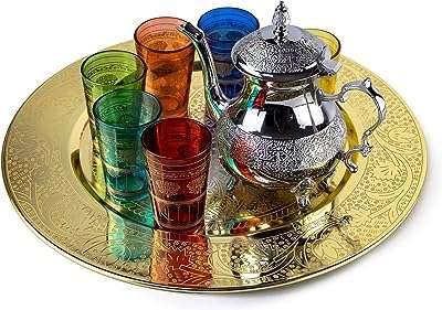 Plateau de service à thé marocain ensemble de 1 théière et 6 tasses en verre. Trouvez tout ce dont vous avez besoin à des prix imbattables chez DIAYTAR COTE D'IVOIRE  - une boutique en ligne généraliste qui vous propose des produits discount pour la maison, l'électroménager, l'informatique et plus encore.