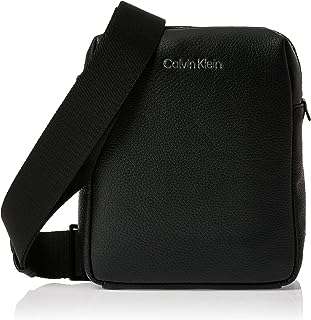 Sac à bandoulière must reporter calvin klein pour hommes ck noir. DIAYTAR COTE D'IVOIRE  - Votre escale en ligne pour des produits discount de qualité. Explorez notre gamme impressionnante de produits allant des articles de maison aux gadgets dernier cri. Profitez de prix imbattables et découvrez pourquoi nous sommes un choix populaire pour les acheteurs avertis à la recherche de bonnes affaires.