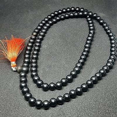Karongali mali naturel non coupé 108 perles rondes noires. Faites de bonnes affaires dès aujourd'hui avec DIAYTAR COTE D'IVOIRE  ! Parcourez notre boutique en ligne généraliste où vous trouverez une large gamme de produits discount, des articles pour la maison à l'électroménager, en passant par l'informatique et la mode. Profitez de nos prix compétitifs et offrez-vous des produits de qualité à moindre coût.
