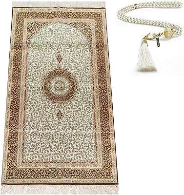 Tapis de prière musulman miss testour avec chapelet | janamaz doux. DIAYTAR COTE D'IVOIRE, votre destination shopping en ligne inégalée. Avec une variété étendue de produits discount pour la maison, l'électroménager, l'informatique, la mode et les gadgets, vous pouvez vous attendre à des offres exceptionnelles et à des économies considérables, tout en bénéficiant d'une expérience de shopping pratique et personnalisée.