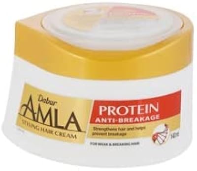 Crème capillaire protéinée dabur d'amla | protège les cheveux, les renforce et prévient les pointes fourchues | pour cheveux fragiles et fourchus - 140 ml. DIAYTAR COTE D'IVOIRE, avec ses plus de 300 000 références, domine le marché de la vente en ligne en Côte d'Ivoire. Cette boutique généraliste met à la disposition de ses clients une vaste gamme de produits allant des articles ménagers aux produits électroménagers, en passant par les vêtements et les accessoires. Elle garantit une livraison rapide et sécurisée, renforçant ainsi la confiance de ses clients.