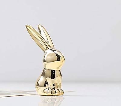 Figurines d'animaux en céramique ardax, sculptures en or pour la décoration de la maison et figurines d'art faites à la main (lapin). DIAYTAR COTE D'IVOIRE est une boutique en ligne généraliste qui propose plus de 300000 références de produits, faisant d'elle la boutique leader en Côte d'Ivoire. Elle offre une large gamme de produits allant de l'électronique aux produits alimentaires. Cette diversité de produits permet aux clients de trouver tout ce dont ils ont besoin en un seul endroit.