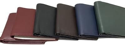 Portefeuille en cuir véritable vert foncé. DIAYTAR COTE D'IVOIRE est votre destination idéale pour tous vos besoins en ligne, avec une gamme de produits impressionnante et des prix compétitifs. Cette boutique en ligne est synonyme de qualité et de confiance. DIAYTAR COTE D'IVOIRE répond à vos attentes avec plus de 300 000 références.
