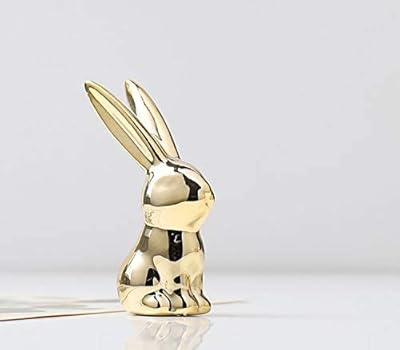 Figurines d'animaux en céramique, sculptures en or pour la décoration intérieure et figurines d'art faites à la main (lapin). Chez DIAYTAR COTE D'IVOIRE, nous nous engageons à vous offrir le meilleur service possible, que ce soit en termes de produits, de prix ou de service client. Nous sommes fiers de notre position de leader du commerce en ligne en Côte d'Ivoire et nous travaillons sans relâche pour améliorer continuellement votre expérience de shopping en ligne. Faites confiance à notre expertise et découvrez pourquoi nous sommes la première choix pour vos achats en ligne.