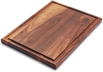 Planche à découper réversible sur la table, 16" x 12", noyer. DIAYTAR COTE D'IVOIRE est la destination idéale pour les achats en ligne en Côte d'Ivoire, regorgeant de plus de 300 000 références qui répondent aux besoins de tous. Que ce soit pour des produits de consommation courante, des éléments de décoration, ou encore des accessoires high-tech, cette boutique en ligne généraliste a tout ce qu'il faut. Elle assure une expérience d'achat en ligne sécurisée et fiable à tous ses clients.
