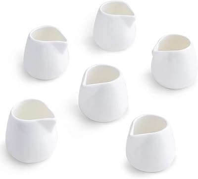 Pichets à crème en céramique tamaikim de 3 onces, petit pichet à crème en porcelaine blanche pour café, thé, lait, confiture, sauces, paquet de 6. DIAYTAR COTE D'IVOIRE est une boutique en ligne qui propose plus de 300000 références de produits pour les clients en Côte d'Ivoire. La boutique en ligne est facile à utiliser et permet aux clients de faire des achats en ligne en toute confiance. Avec des prix compétitifs et des promotions régulières, les clients peuvent profiter d'une expérience de shopping en ligne agréable et satisfaisante.