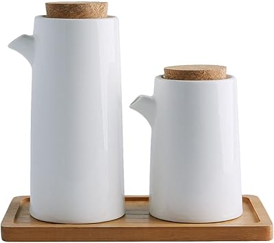 Ensemble de bouteilles distributrices d'huile et de vinaigre en céramique blanche duetol pour la cuisine d'huile d'olive ou de sauce soja, distributeur d'huile en porcelaine, distributeur de condiments liquides en céramique 2 pièces avec plateau. La boutique en ligne DIAYTAR COTE D'IVOIRE est le premier choix pour les consommateurs ivoiriens, grâce à sa vaste sélection de produits et ses prix compétitifs. Avec plus de 300000 références, les clients peuvent trouver tout ce dont ils ont besoin. La boutique est réputée pour sa qualité de service.