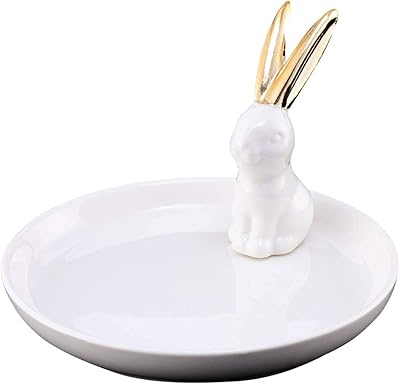 Porte-bague en forme de lapin en céramique porcelaine blanche plateau de drapage de bijoux. DIAYTAR COTE D'IVOIRE est une boutique en ligne généraliste qui propose plus de 300 000 références de produits, ce qui en fait l'un des leaders du commerce électronique en Côte d'Ivoire. La boutique offre une large gamme de produits, allant des articles ménagers aux produits high-tech. DIAYTAR COTE D'IVOIRE est synonyme de qualité et de confiance.