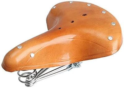 Selle de vélo large sans nez selle montagne confortable marron route vintage vtt en cuir. DIAYTAR COTE D'IVOIRE propose une expérience d'achat unique, personnalisée pour répondre aux besoins spécifiques de chaque client. La plateforme permet aux utilisateurs de naviguer facilement à travers ses catégories de produits, d'effectuer des recherches ciblées et de découvrir de nouvelles marques et articles. Les clients bénéficient également d'un service client toujours disponible pour les aider.