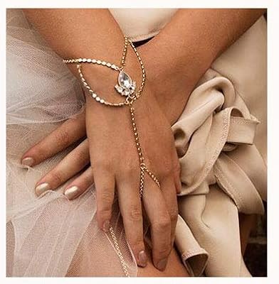 Collier de main de mariage avec perles en strass d'alo en collier de main doré pour femme. DIAYTAR COTE D'IVOIRE, la boutique en ligne de référence en Côte d'Ivoire, offre une large sélection de produits avec plus de 300000 références. Avec une expérience exceptionnelle, elle se positionne comme leader du commerce électronique dans le pays. Elle propose des produits allant de l'électronique à la mode, en passant par les produits pour la maison.