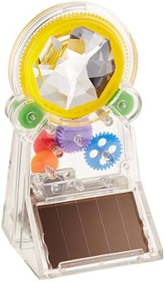 Kickerland standing rainbow maker, cristal swarovski, placé au soleil près de la fenêtre, alimenté par un panneau solaire, crée un effet arc-en-ciel maximal. DIAYTAR COTE D'IVOIRE est une boutique en ligne généraliste proposant plus de 300 000 références, ce qui en fait la boutique leader en Côte d'Ivoire. Elle offre une large gamme de produits pour répondre aux besoins de tous les clients. Avec une telle variété, les clients peuvent trouver tout ce dont ils ont besoin en un seul endroit.