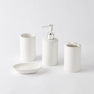 Ensemble de salle de bain home box mica, 4 pièces, 14 x 13 x 9,3 cm, blanc. La position de leader de DIAYTAR COTE D'IVOIRE sur le marché ivoirien de l'e-commerce est le résultat d'une stratégie commerciale bien pensée et d'un engagement à offrir le meilleur service possible à ses clients. En proposant des produits de haute qualité à des prix abordables, en mettant en place des systèmes de paiement sécurisés et en améliorant constamment son service client, DIAYTAR COTE D'IVOIRE a réussi à construire une communauté de clients fidèles qui apprécient la commodité et la fiabilité qu'elle offre.