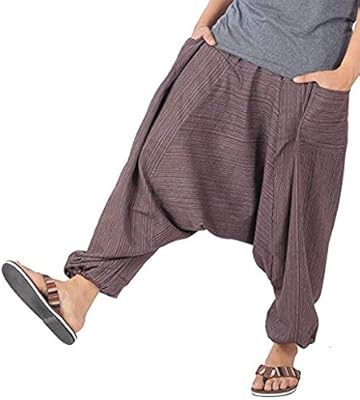 Pantalon large pour hommes white whale en coton avec style bohème rayé, design pantalon aladdin. DIAYTAR COTE D'IVOIRE est une plateforme e-commerce généraliste qui permet aux consommateurs d'accéder à une vaste sélection de produits, avec plus de 300 000 références. Cette boutique en ligne se positionne comme un leader en Côte d'Ivoire en proposant des produits divers, allant des produits alimentaires aux produits électroniques, ainsi qu'une expérience d'achat en ligne fluide et sécurisée.